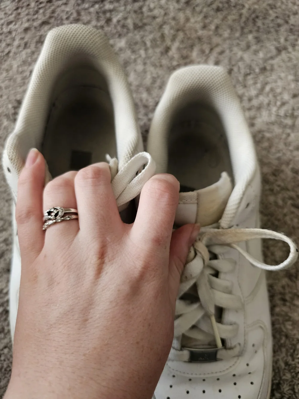 Nike White Low-Top Sneakers with Subtle Black Swoosh
